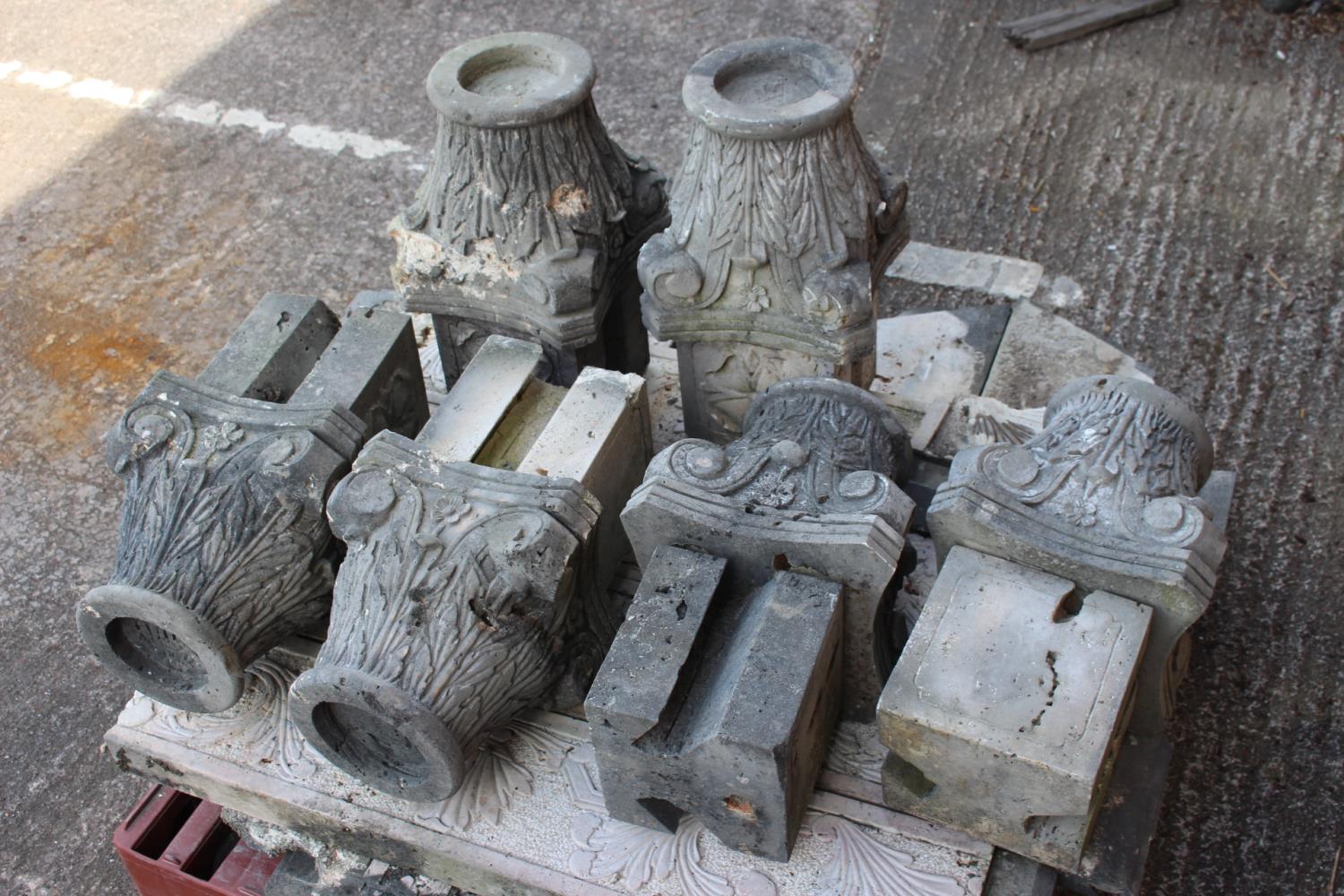 Six composition stone Corinthian heads.