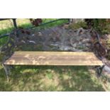 Cast iron three seater garden bench.