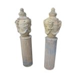 Pair of carved marble lidded urns.