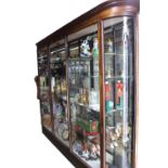 Exceptional quality 19th C. mahogany mirrored back shop display cabinet .