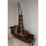 Large wooden model of a Galleon ship.