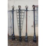 Set of four Victorian cast iron street lamps.