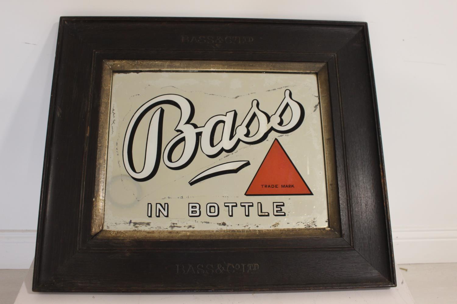 Bass in Bottle advertising mirror in original oak frame.