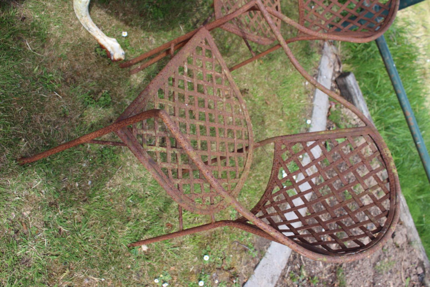 Cast iron garden table and four chairs. - Image 2 of 2