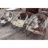 Set of six chrome arm chairs.