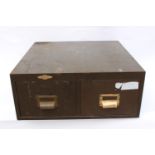 Metal two draw desk top filing cabinet.