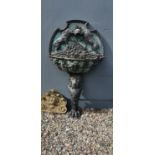 Good quality bronze wall fountain decorated with lions.