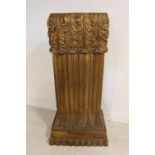 Wooden gilded pillar decorated with acanthus leaf .