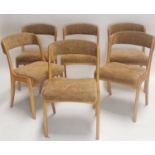 Set of six mid-century upholstered dining chairs.