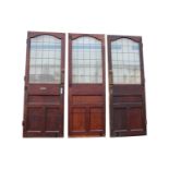 Three 19th C. pitched pine and glass doors.