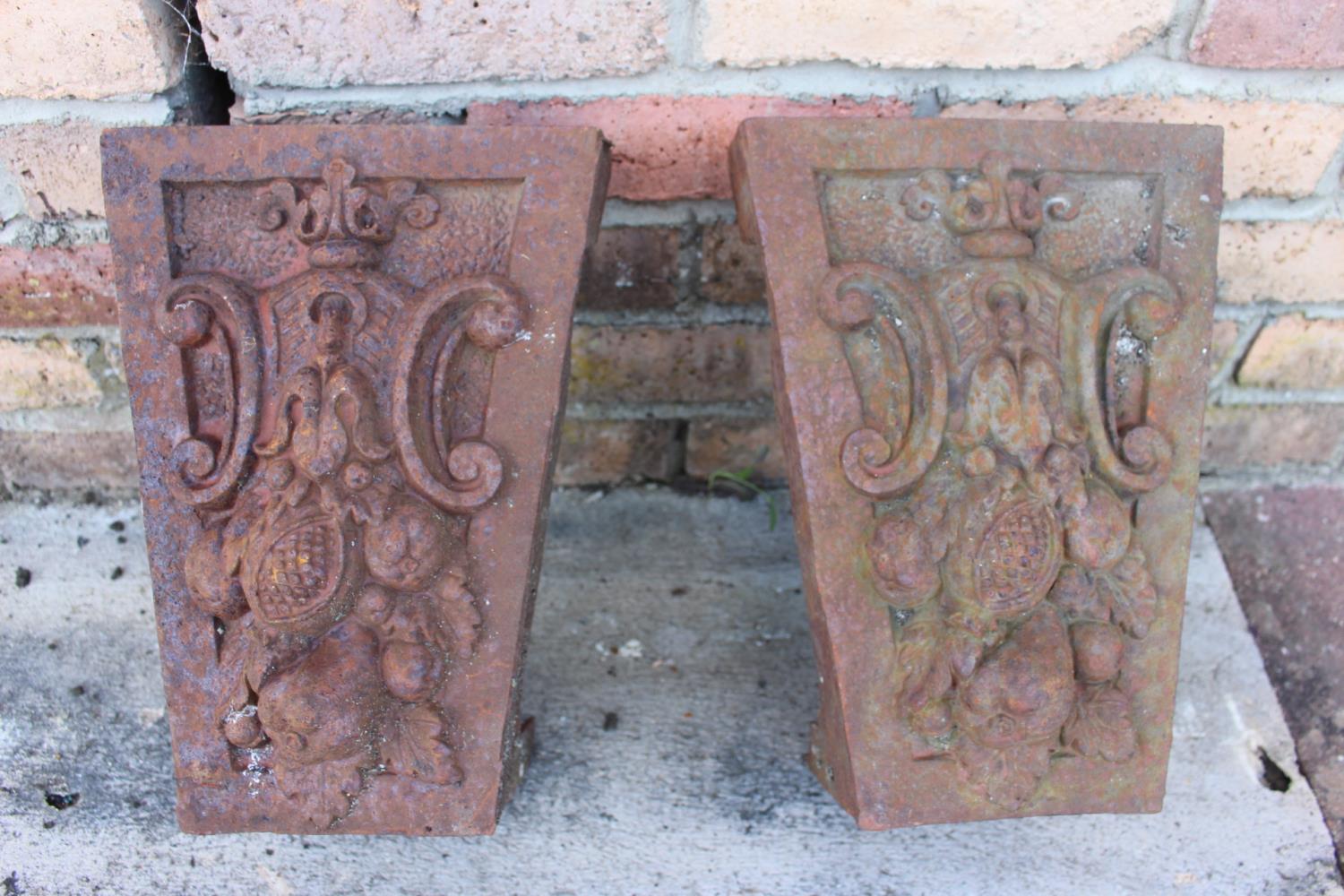 Pair of decorative cast iron corbels.