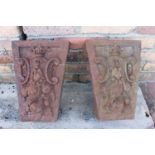 Pair of decorative cast iron corbels.