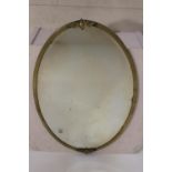 Art Deco brass wall mirror.