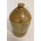 McAllister & Sons Wine & Spirit Merchants Ballymena stoneware flagon.