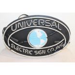 Vintage neon Universal Electrics Sign Co, Inc advertising sign.