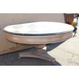 Wooden circular table.