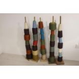 Set of five sewing spools.