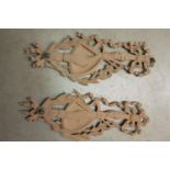 Pair of carved mahogany wall hangings decorated with swags and torches {58 cm H x 21 cm W each}.