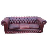 Leather three seater Chesterfield sofa.