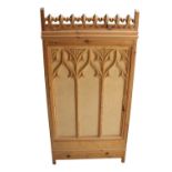 Carved pine panel in the Gothic style.