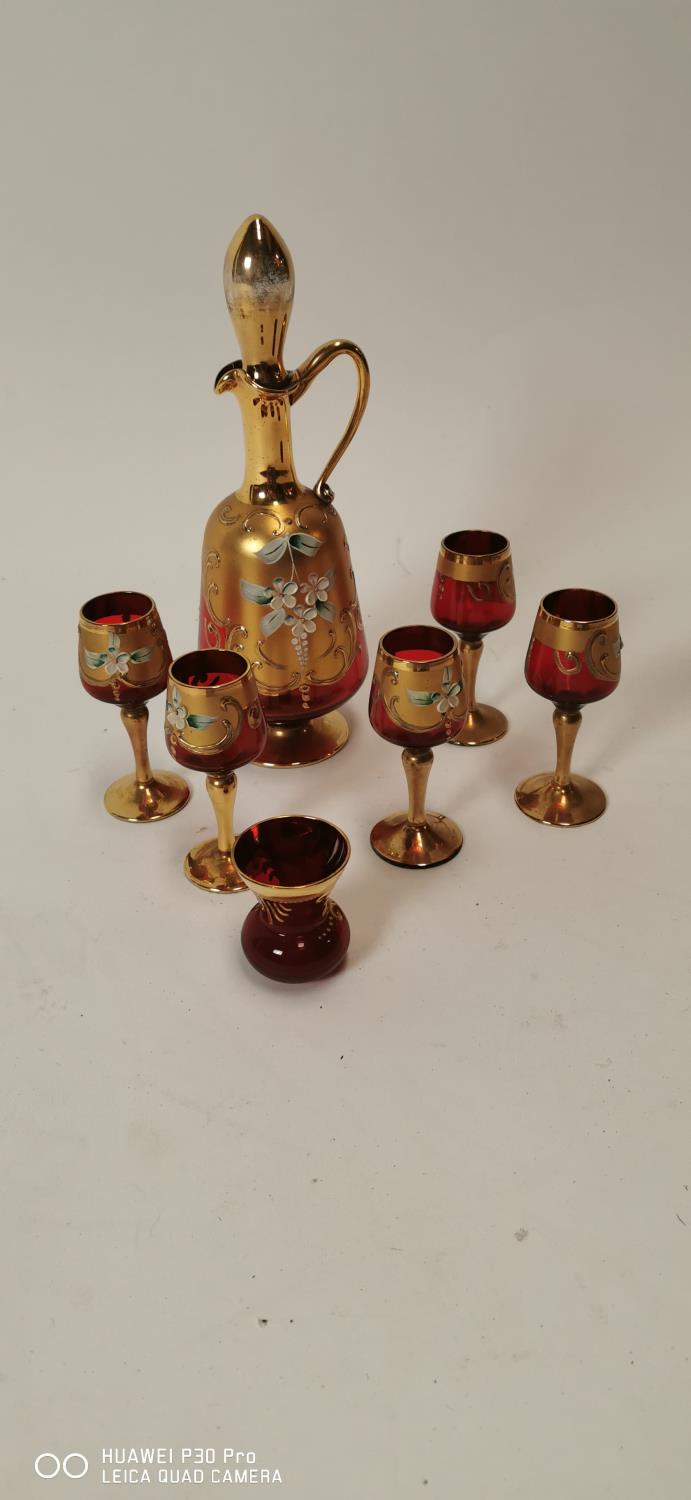 Edwardian hand painted and gilded cranberry glass sherry set.