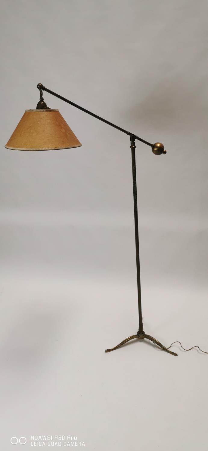 Brass standard angle poise lamp.