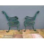 Pair of decorative cast iron bench ends.