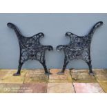 Pair of decorative cast iron bench ends.