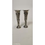 Pair of English silver embossed vases.