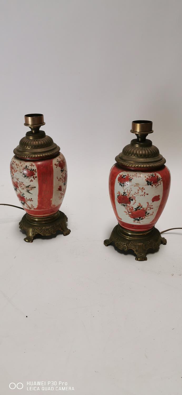 Pair of 19th C. brass and ceramic oriental table lamps.