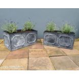 Pair of good quality wrought iron planters.