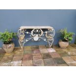 Wrought iron garden table.