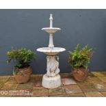Decorative cast iron two tiered water fountain.