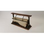 Early 20th C. cast iron and wooden shop paper cutter.