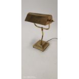 Brass desk lamp.