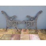 Pair of decorative cast iron bench ends.