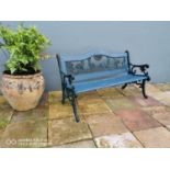 Cast iron and wooden child's garden bench.