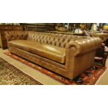 Exceptional quality hand died leather chesterfield four seater sofa.