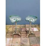 Pair of cast iron Slattley tractor seat bar stools.