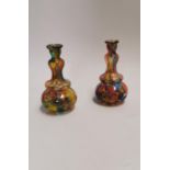 Pair of early 20th C. end of day glass vases.