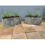 Pair of good quality wrought iron planters.