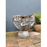 Early 20th C. composition urn in the Neo Classical style {64 cm H x 68 cm Dia.}.