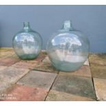 Pair of glass onion bottles.