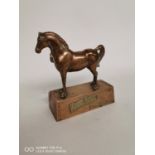 Rare brass White Horse advertising figure.