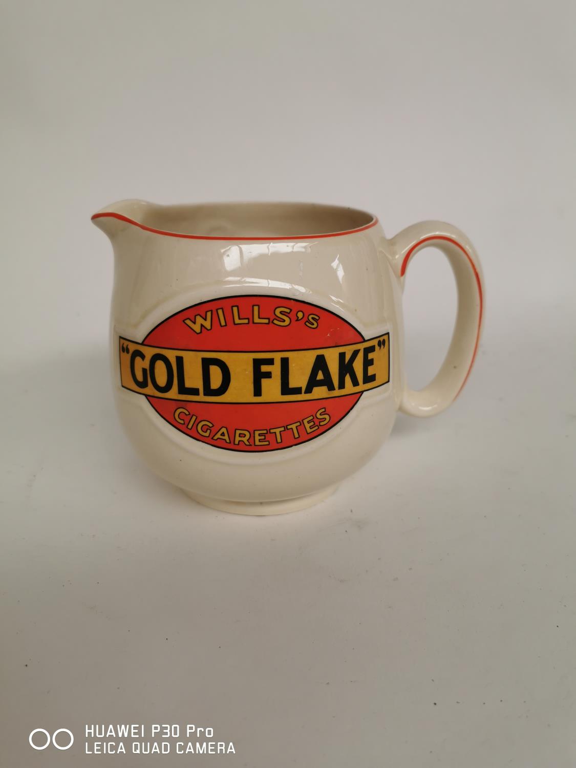 Gold Flake ceramic advertising jug.