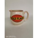 Gold Flake ceramic advertising jug.