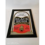 Black Bush framed whiskey advertisement.