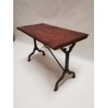 Early 20th. C. cast iron pub table with painted pine top. (70 cm H x 101 cm w x 55 cm D).