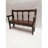 10th. C. oak hall bench with single drawer in frieze. (86 cm H x 110 cm W x 41 cm D).