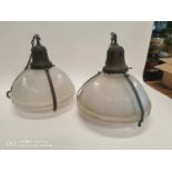 Pair of 1940's holophane hanging light shades with original copper brackets.